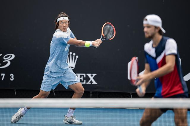 新球体育下载-张奔斗:澳网男双四强张之臻,并不想当双打专家